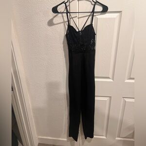 PrettyLittleThing Black Lace Detail Jumpsuit size 0 gently used